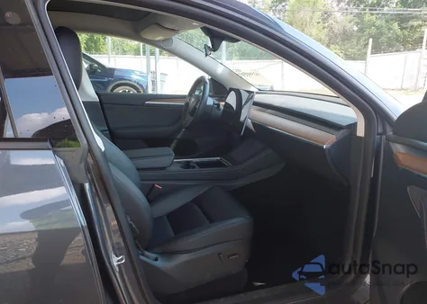 2023 Tesla Model Y Rwd из США, поврежденный, VIN 7SAYGDED8PF923374